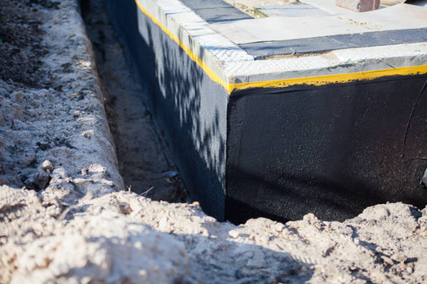 Professional Interior Drainage System technician working in River Edge, NJ